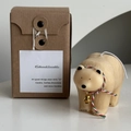 Polar bear candle in cream color with red and green collar in a kraft gift box - Light Brown Polar Bear with Bell