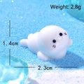 Miniature white resin seal figurine for DIY micro landscape decor, 2.3cm wide - Rising Seal