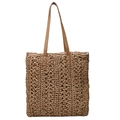 Detail of hand-woven star pattern on brown straw tote bag with thin faux leather handles - Khaki