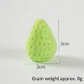 Miniature light green PVC strawberry model with dimensions 3cm height and 2cm width - Green Strawberry - No Buckle