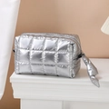 Chic silver quilted makeup bag with metallic finish and top zip closure for travel - Octagonal Pouch / Silver