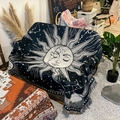 Detail of bohemian sun and moon woven camping blanket with fringes on white pebbles - 130x160cm / Moonlight Blue