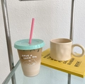 Cute plastic coffee cup with mint green lid and beige ceramic mug on a glass shelf - 470ML / Small Puppy