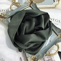 Detail of dark green mulberry silk scarf folded into a rose on a vintage tray - 15x150cm / Army Green