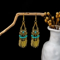 Bohemian gold ethnic earrings with sky blue beads and leaf pendants on a dark background - Gold Cyan Feather Ethnic(E5987-5)