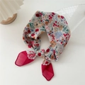 Floral cotton linen square scarf tied in a bow with vibrant red flower patterns - Red Floral-Curved Frame
