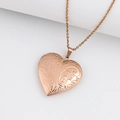 Rose gold heart locket necklace featuring vintage floral engraving on a delicate chain - Plant Pattern Heart/Rose Gold