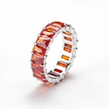 Detailed side view of silver ring with eternity band of orange rectangular cubic zirconia - US 6 / Steel Red Zircon