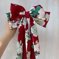 Fashionable dark red floral bow hair clip with elegant long ribbon and satin print - Red Cloud