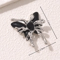 Gothic butterfly pendant in silver metal with black inlay measuring 3.5cm by 2.9cm - Modern Art Butterfly Style