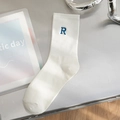 White cotton crew sock featuring a blue embroidered letter R in a sporty minimalist style - One Size / White Letter R