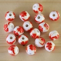 Close-up of ceramic beads with red flower patterns and holes for DIY jewelry - No.32-Red Small Flower