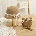 Detail view of woven straw hat and matching bag set with white lace bow accents - S (Kids 52cm 1-6Y) / Khaki Hat + Bag