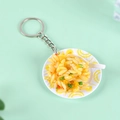 Realistic miniature egg fried rice keychain with tiny spoon on a light green base - Fried Rice - Keychain
