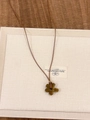 Detail of flower pendant necklace with tiger eye stone finish on a brown cord - Tiger Eye Texture Flower (XL0590)