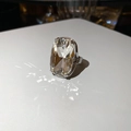 Macro shot of silver ring featuring a large rectangular cut diamond in a claw setting - Silver Rectangle Clear Zircon (20#)