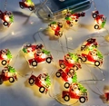 Christmas LED light string featuring red truck with Santa Claus and a warm yellow glow - 1m 10-LED (2AA Battery Model) / Car