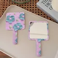 Portable purple floral hand mirror with blue embossed flower and handheld handle - 06 Beautiful Flowers