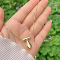 Polished 18K gold balloon letter T pendant necklace with minimalist mirror finish - Gold T
