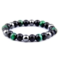 Macro detail of 8mm green tiger eye, obsidian and hematite beads on a yoga energy bracelet - Green Tiger Eye Hematite Style (Style-09)