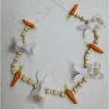 Detail of Easter bunny and carrot garland featuring felt rabbits and wooden beads - White Bunny & Carrot Garland (100cm)