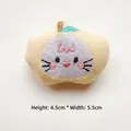 Detailed view of cream plush cartoon face patch with embroidery, 4.5cm height x 5.5cm width - Rabbit Apple Yellow