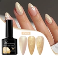 Macro shot of pearl champagne shell thread gel nail polish with spiral texture and luster - Shell Thread Gel TS008 (Champagne Gold)