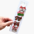 Detailed close-up of 10-piece Christmas hair ties featuring Santa and reindeer designs - 10-Piece Christmas Hair Tie Collection