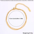 Dettaglio del bracciale a catena multistrato in acciaio dorato con misure e chiusura a moschettone - Oro Doppio Strato Catena Serpente