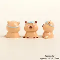 Dreiteiliges Set aus Harz-Wasserschweinen mit blauen Stirnbändern und Glanzfinish - Taucher-Capybara