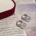 Detail of 925 silver hoop earrings with shimmering iridescent beads and pavé crystals - Silver Rhinestone Aura Bead Huggie Style (A37 Silver)