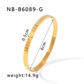 Macro detail of 0.5cm wide gold bracelet featuring a textured square ice cube pattern - 18K Gold / Gold (NB-B6089-G)
