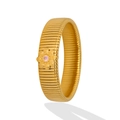 Close-up of golden Tubogas ring featuring a floral design and a pink gemstone inlay - Pink Flower Decorative Style (YS705)