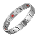 Macro detail of silver stainless steel magnetic therapy bracelet with red and white inserts - Silver