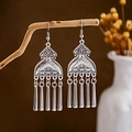 Macro detail of retro ethnic metal tassel earrings on a branch with vintage silver finish - E2874-22/Geometric Hollow Pillar