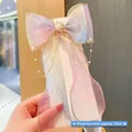 Girl's rainbow gradient organza bow hair clip with pearls and 25cm streamers - Light Blue With Hexagram Streamer