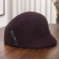 Detailed view of dark purple wool cloche hat with beaded flower and rose metal buckle - M (56-58cm) / Purple