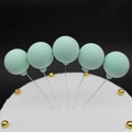 Mint green soft clay balloon cake toppers on a white cake for party decoration - Single Piece / Tiffany Blue
