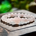 Handmade beaded bracelet with pink crystal stones and heart pendant on wood - Heart Pendant / Pink (Rose Quartz)