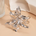 Detail of silver metallic flower bracelet with hammered texture and artistic liquid metal finish - Bracelet - Silver Flower