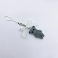Cute grey flocked bear keychain with white ribbon bow and lanyard on white background - Grey Bear