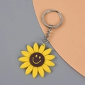 Portachiavi girasole giallo in PVC con faccina sorridente e anello in metallo per borse - Faccina sorridente