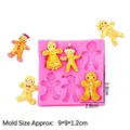 Pink silicone mold with 6 gingerbread man shapes and finished yellow treats 9x9x1.2cm - 6# Pink Gingerbread Man