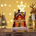 Detail eines leuchtenden Weihnachts-Miniaturhauses mit Toy Land Aufschrift und Kunstschnee - Modell A Leuchthaus (Toy Land)