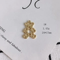 Macro shot of 24x17mm gold hollow bear pendant with weight detail on white background - 1# Hollow Bear