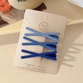 Set of 4 gradient blue cross-shaped hair clips on a card for girls styling - Blue Gradient Cross Set
