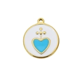 Goldener runder Anhänger mit hellblauem Herz und gepunktetem Kreuz-Detail - Weißer Boden Blaues Herz
