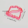 Pink translucent Christmas hat sandwich cutter and bread mold for DIY bento making - Dinosaur - Pink