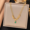 Layered gold starfish necklace with emerald green rectangular gemstone pendant on jewelry box - 5 [ah322] Small Pieces Of Silver Lvzuan Necklace Gold