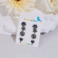 Juego de cuatro pendientes de flores en acero inoxidable negro mate en tarjeta - Juego de 4 Pares / Negro